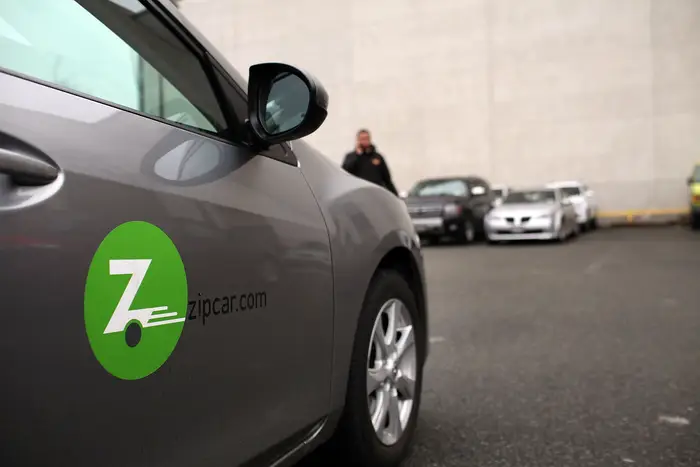 A Zipcar is parked in Brooklyn.